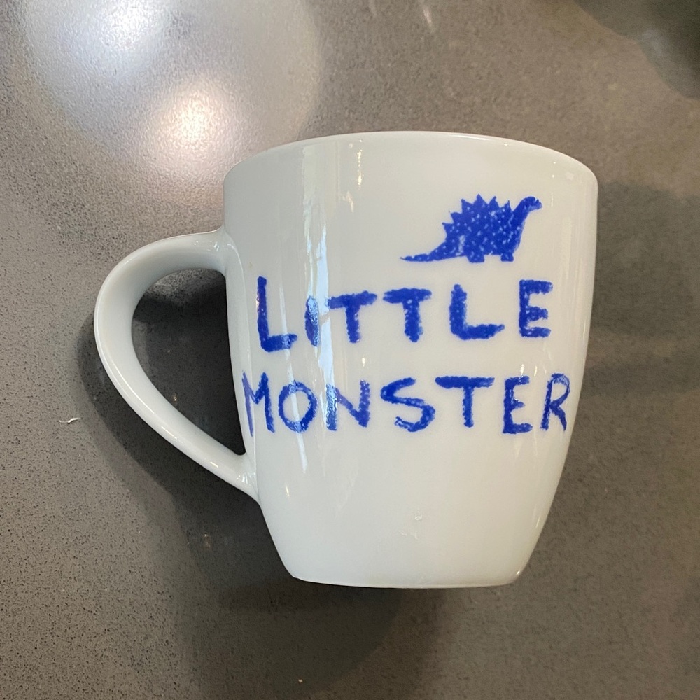 White Ceramic Mug with Blue "Little Monster" Text